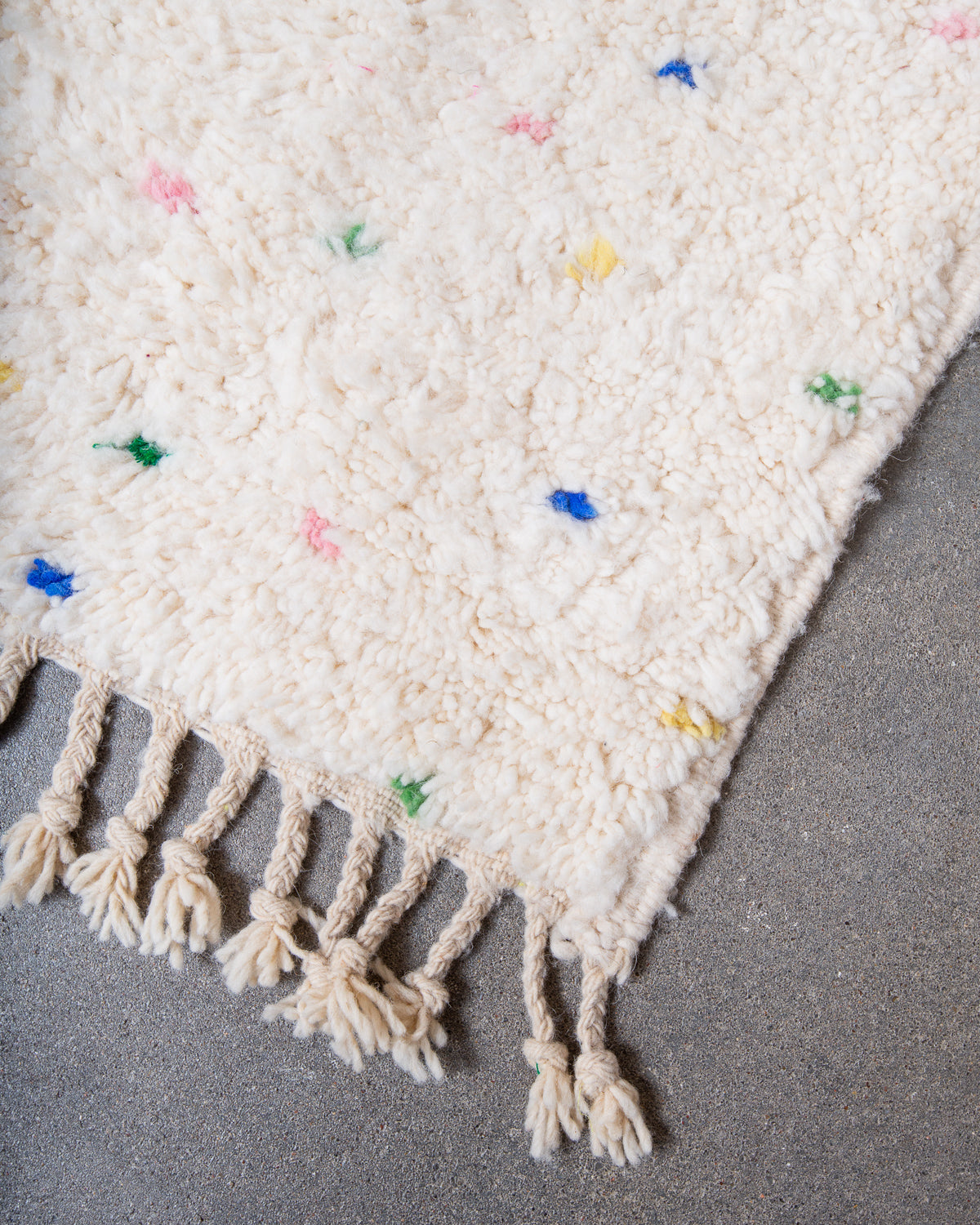 Modern, designer, handcrafted Berber rug from Morocco. Beniourain carpet with beautiful colours and patterns and fluffy wool texture.